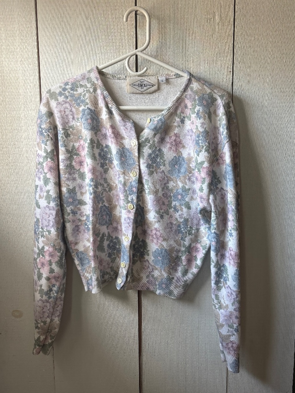 Vintage woman’s flowered cardigan